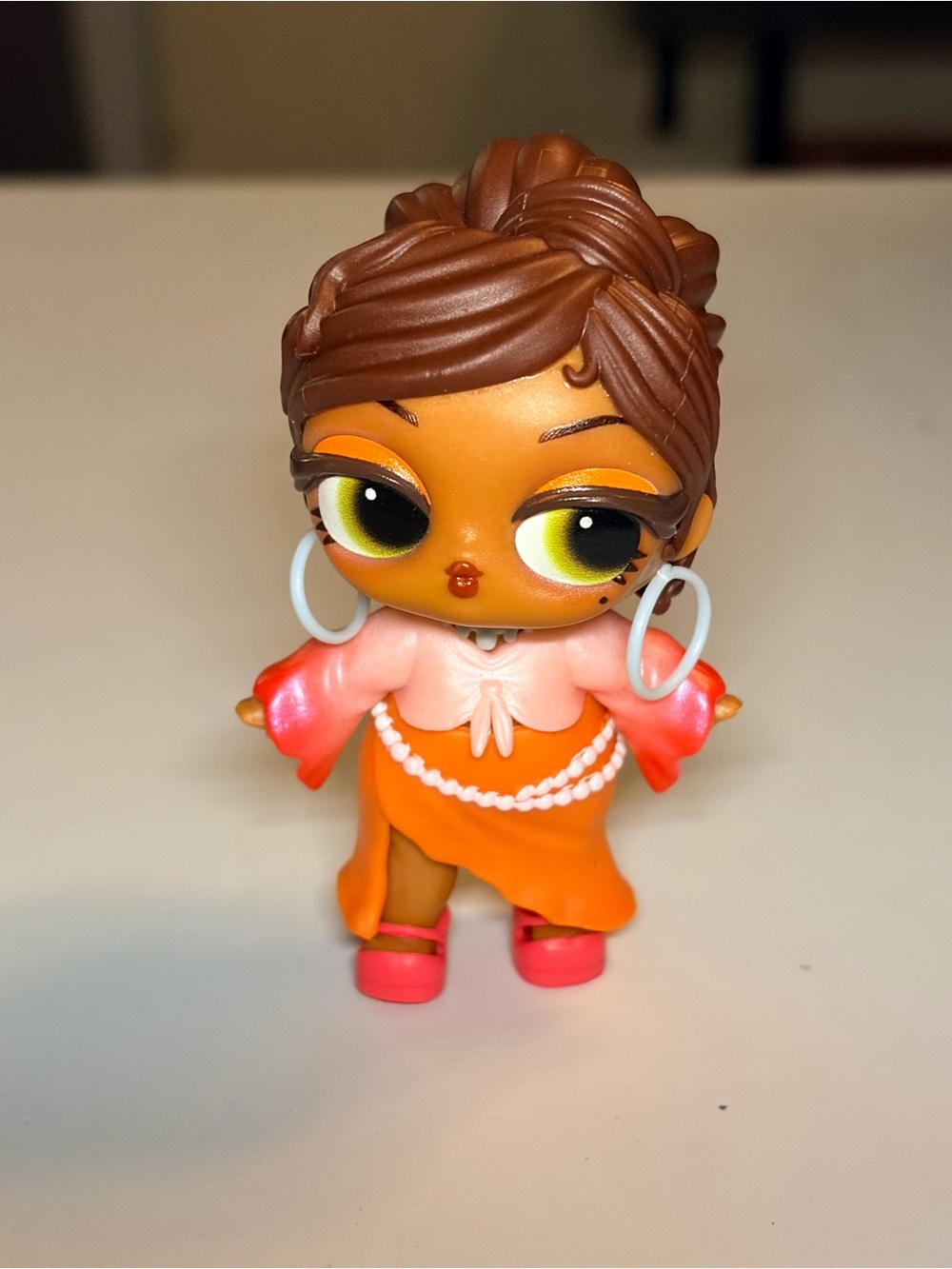 L.O.L. Surprise! Orange and Pink Fashion Doll with Hoop Earrings